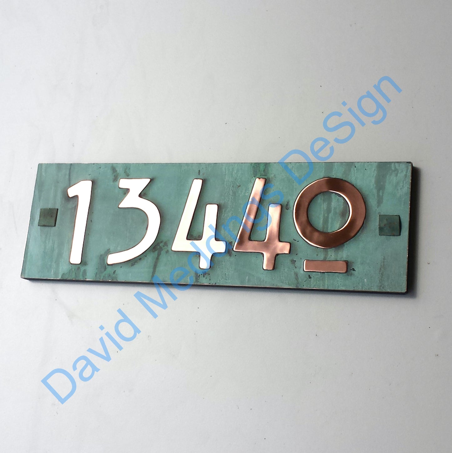 patinated Mackintosh style houe plaque