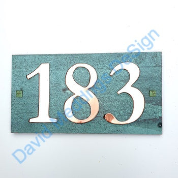Traditional green copper plaque