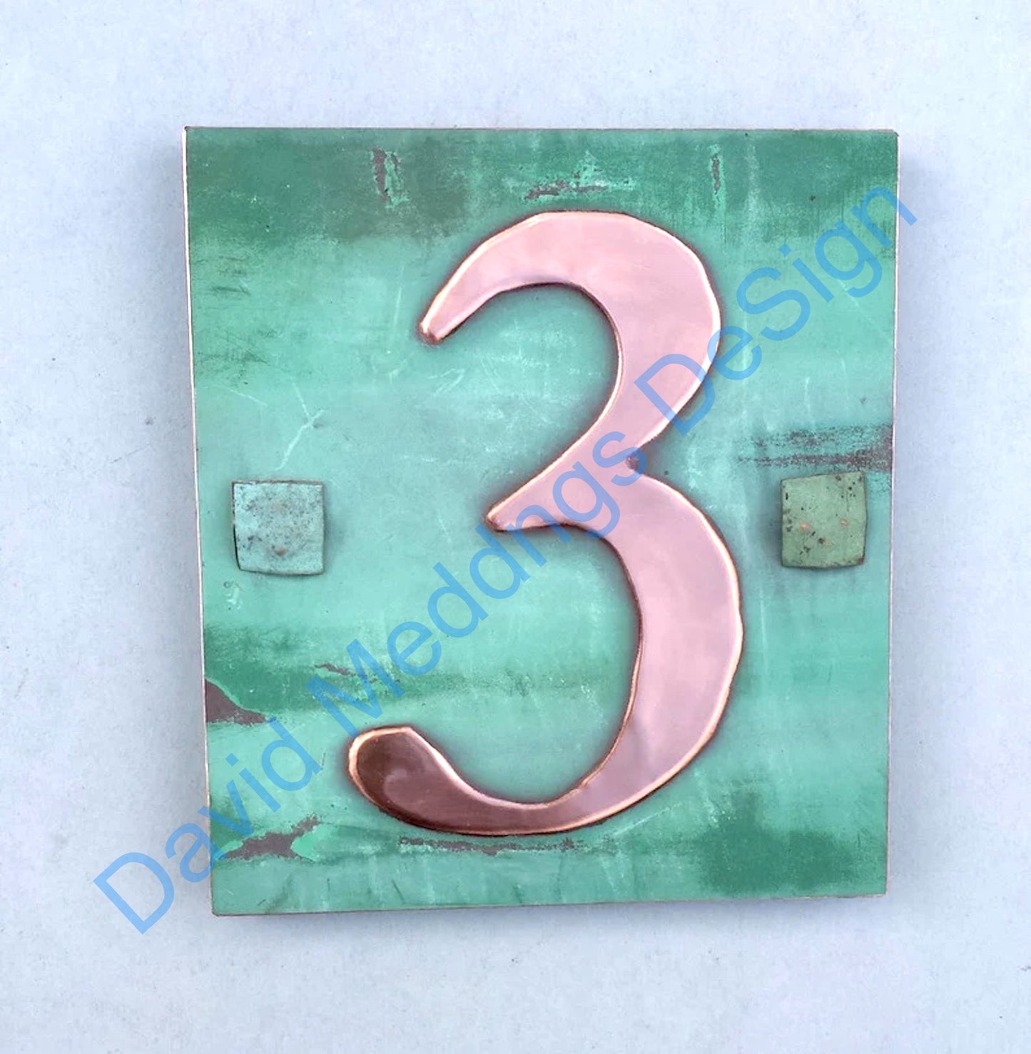 Traditional green copper plaque
