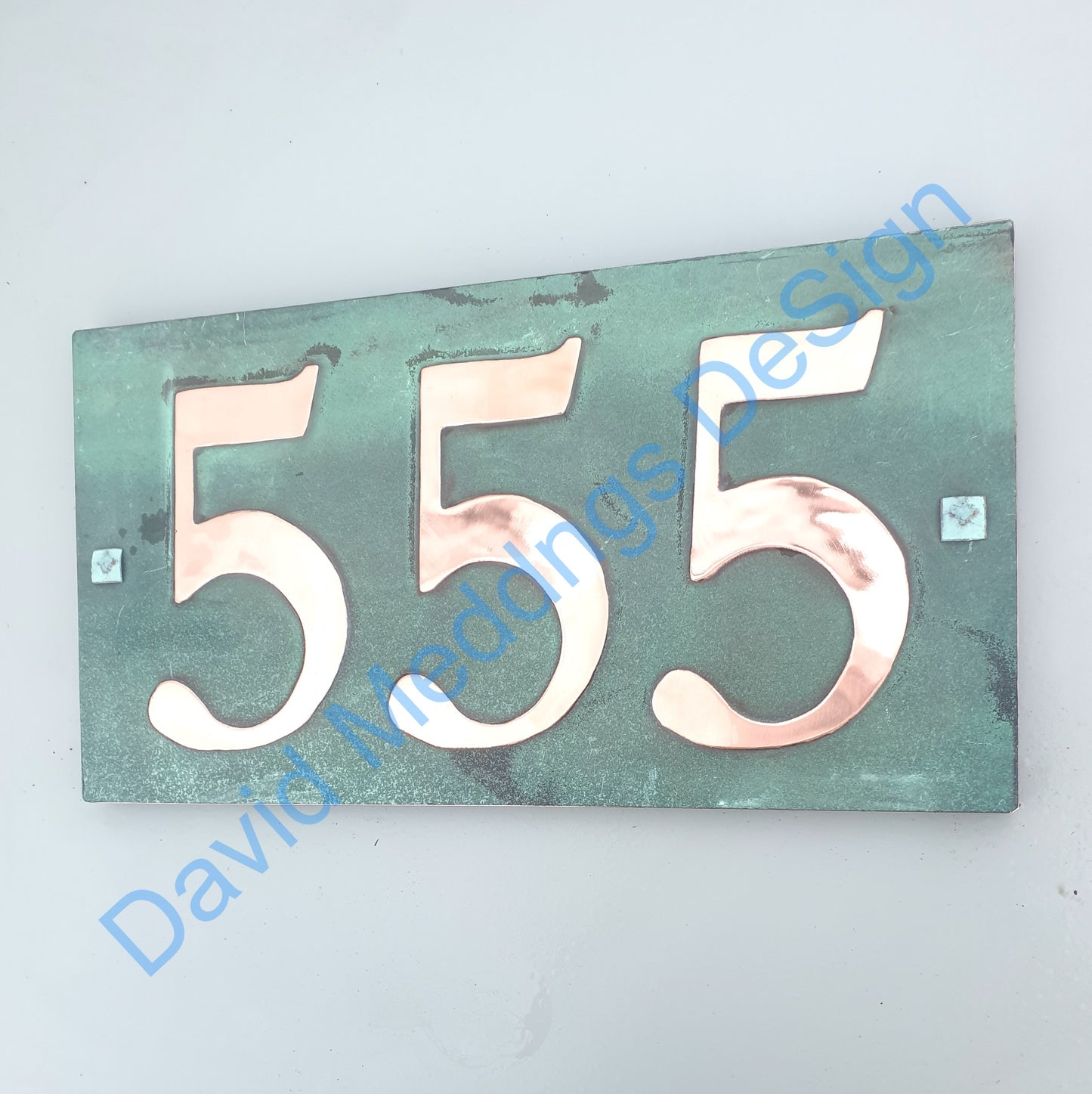 Traditional green copper plaque