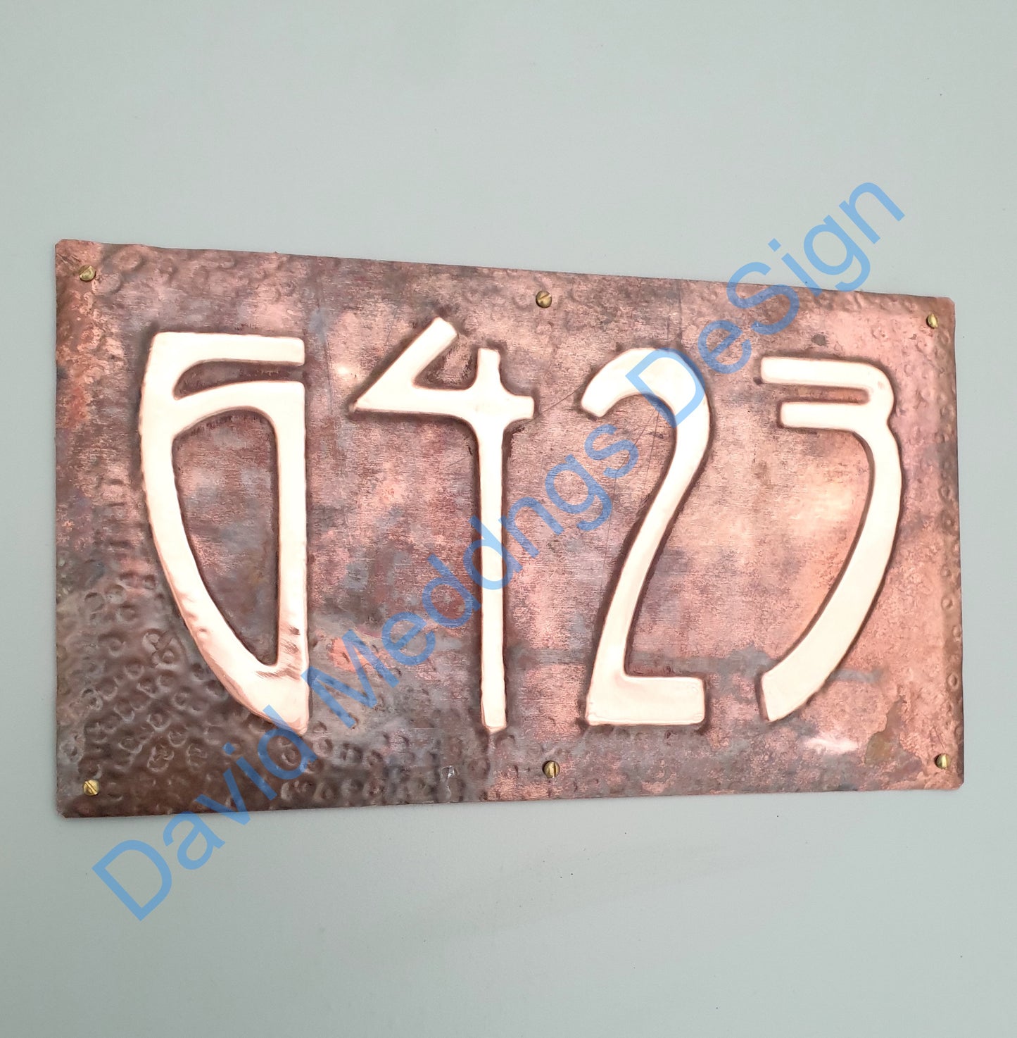 Art nouveau hammered copper plaque