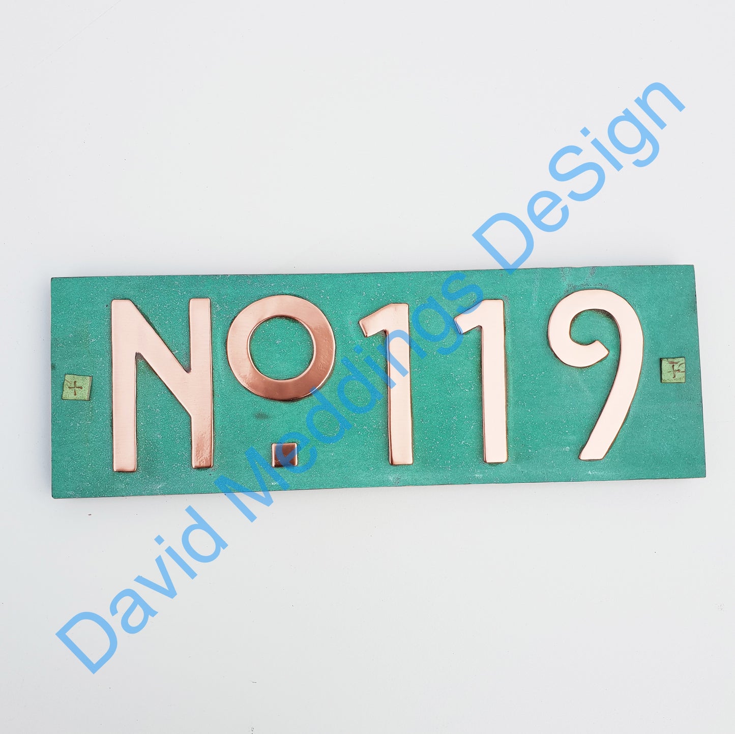 Mackintosh patinated copper plaque with plywood back