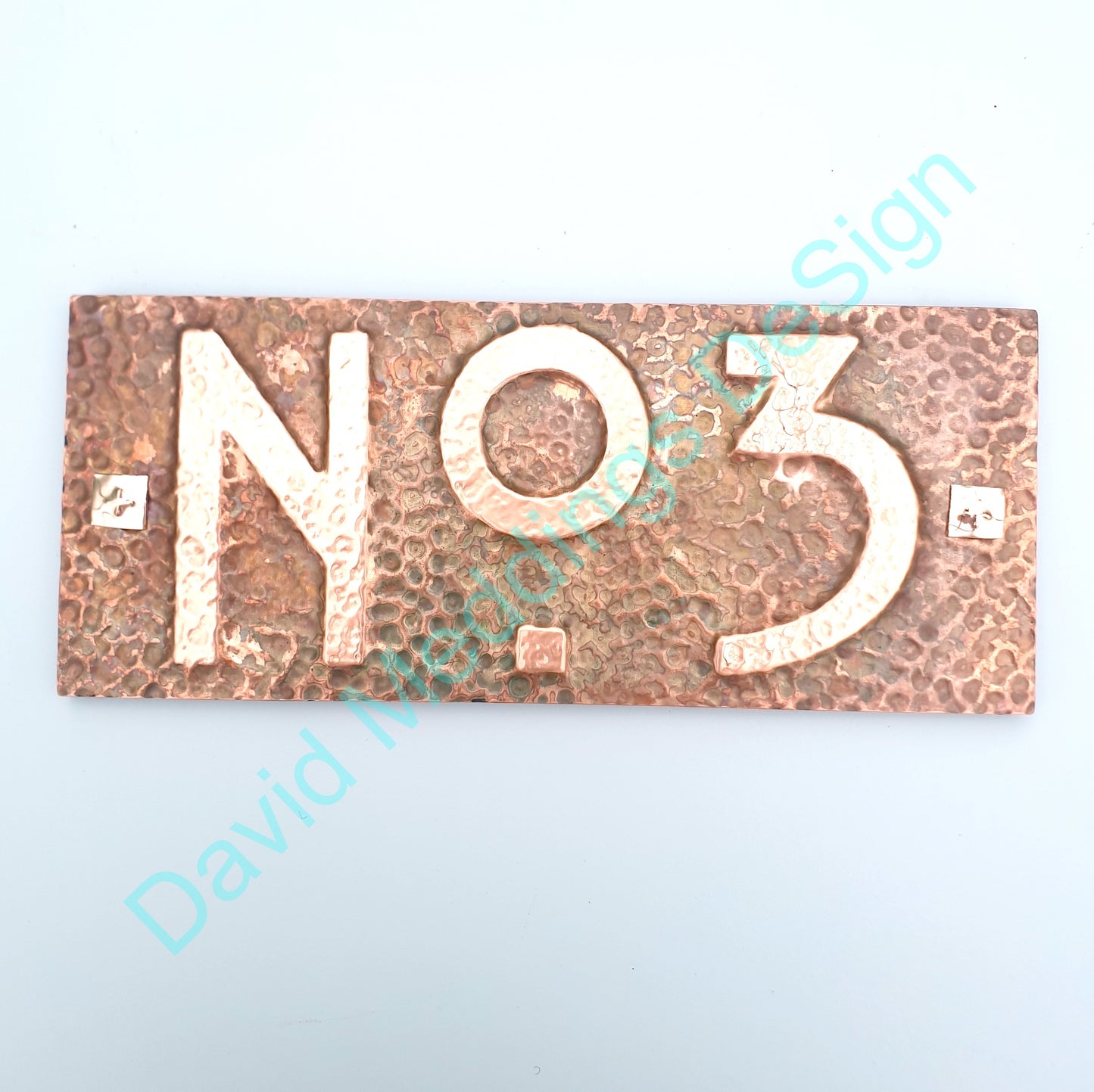 Mackintosh hammered copper plaque with plywood back
