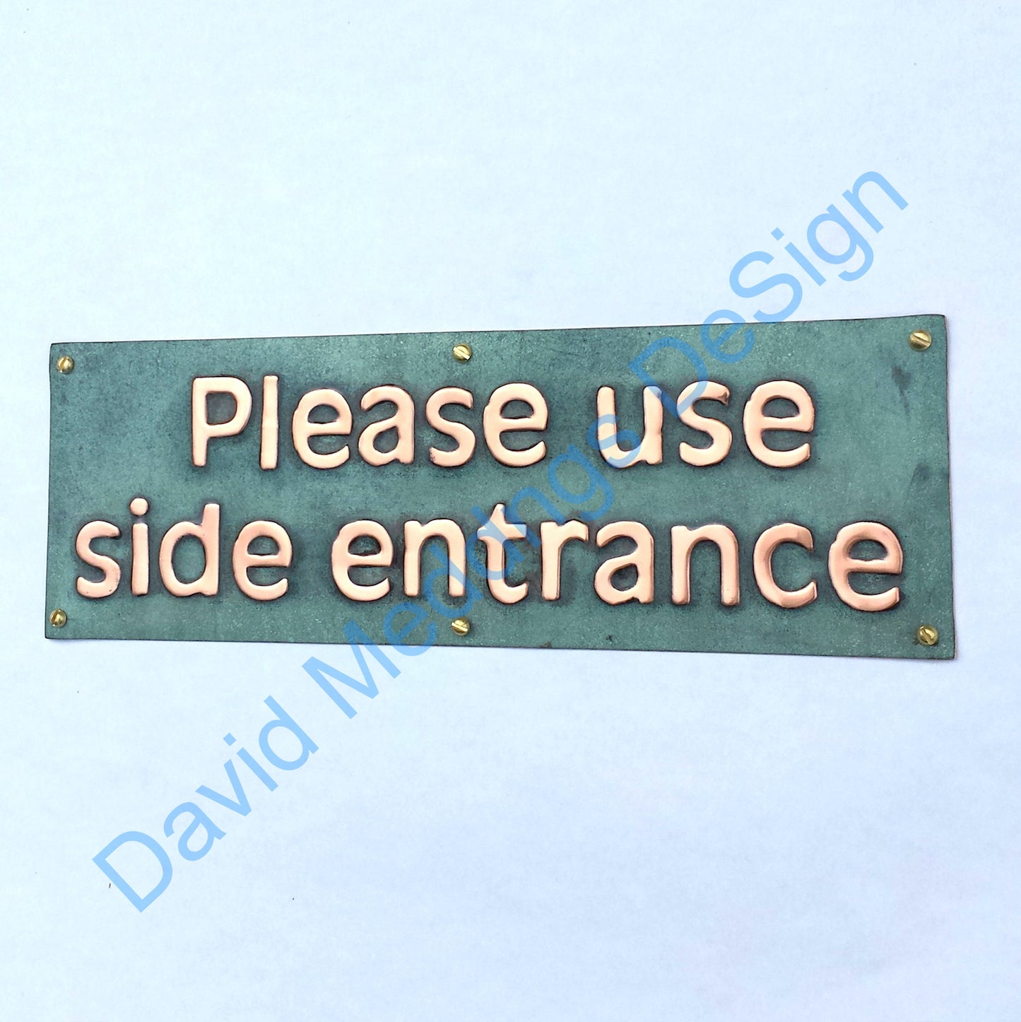 Please use side entrance copper plaque