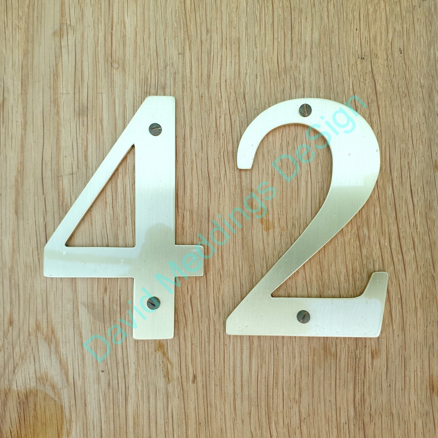 42 garamond_brass number brush